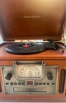 Crosley CR74 Radio, Cassette, Cd & Record Turntable Player. Fixed Price $99.00.