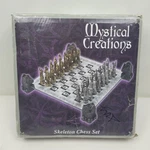 Mystical Creations Skeleton Chess Set New With Open And Damaged Box. Fixed Price $88.00.