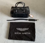 Genuine Aston Martin Small Holdall Luggage Bag Black Fabric & Spectral Blue New. Fixed Price $914.60.