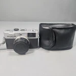 Olympus Rc 35MM Rangefinder Film Camera E. Zuiko 42MM F/2.8 Lens Uv Filter. Fixed Price $109.95.